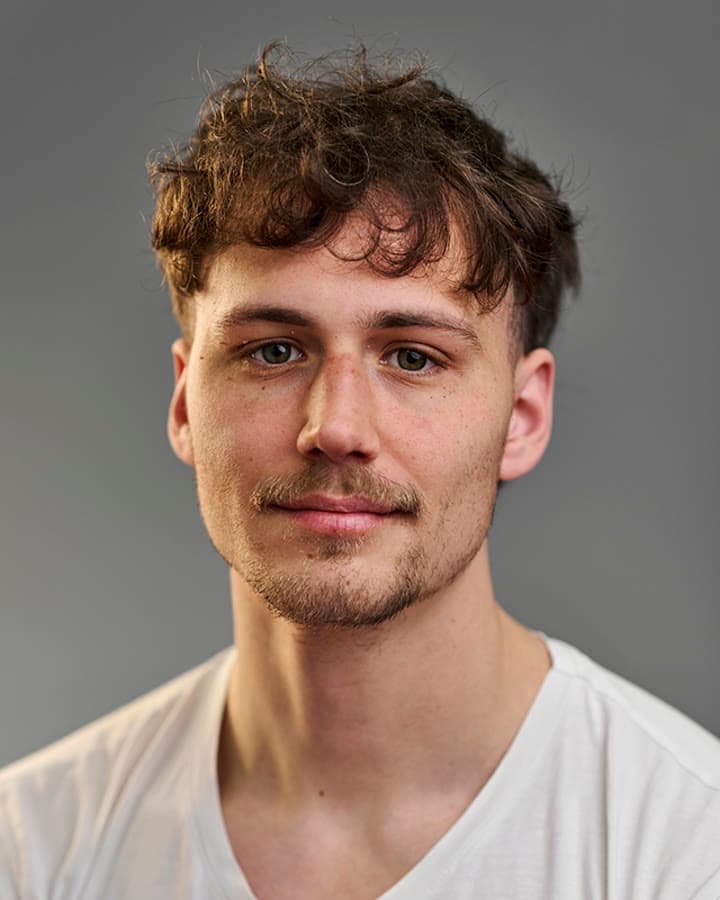 Máté Pojbics, web developer, head-and-shoulders portrait.
